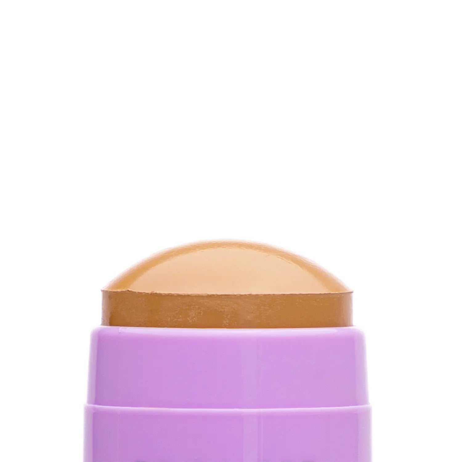 Close-up of a cosmetic Italian made-vegan makeup bronzer stick named BC bronze-colored swatch with a textured surface. Daily Dose.
