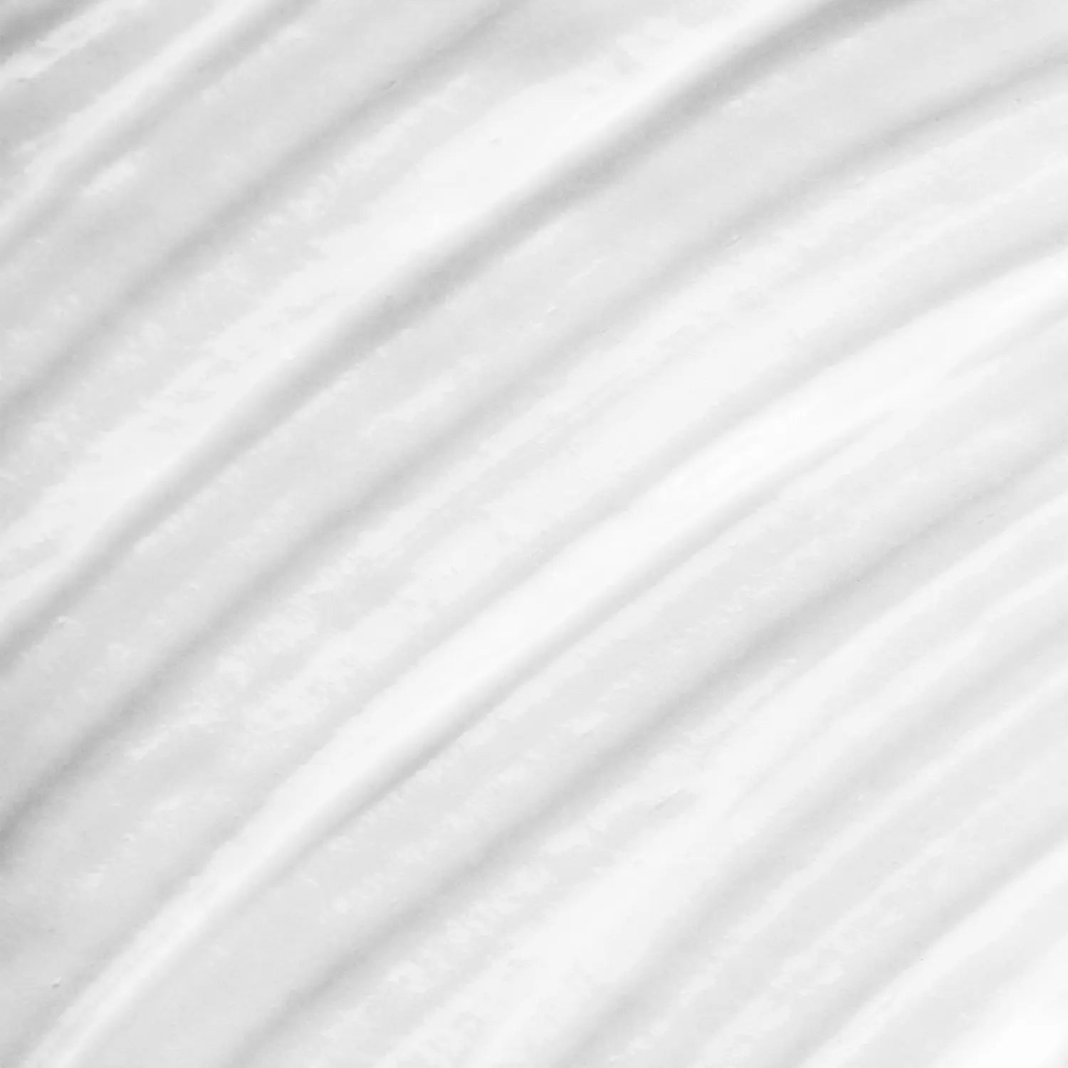 A cream-colored makeup hydrating face serum swatch with a textured surface of Daily Dose a cosmetic vegan made Italian brand. 