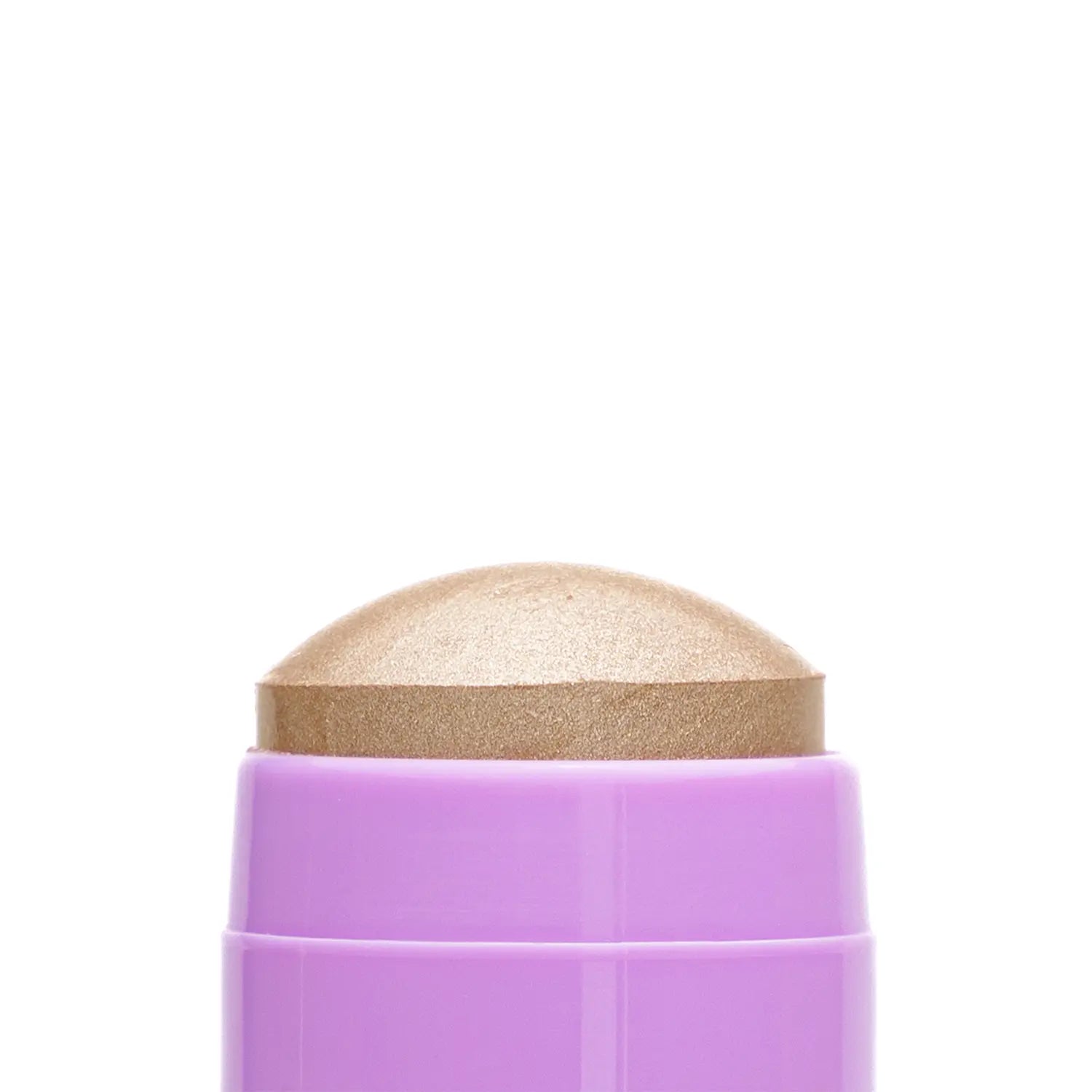 Close-up of a cosmetic Italian vegan highlighter stick named PLS brown-colored makeup swatch with a textured surface.